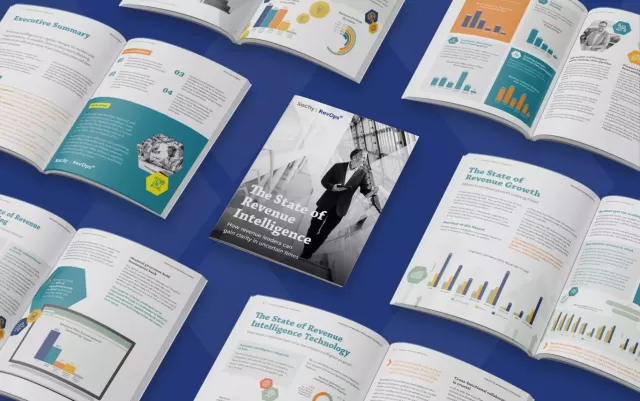 A spread of magazines featuring The State of Revenue Intelligence in the middle, all on a blue background