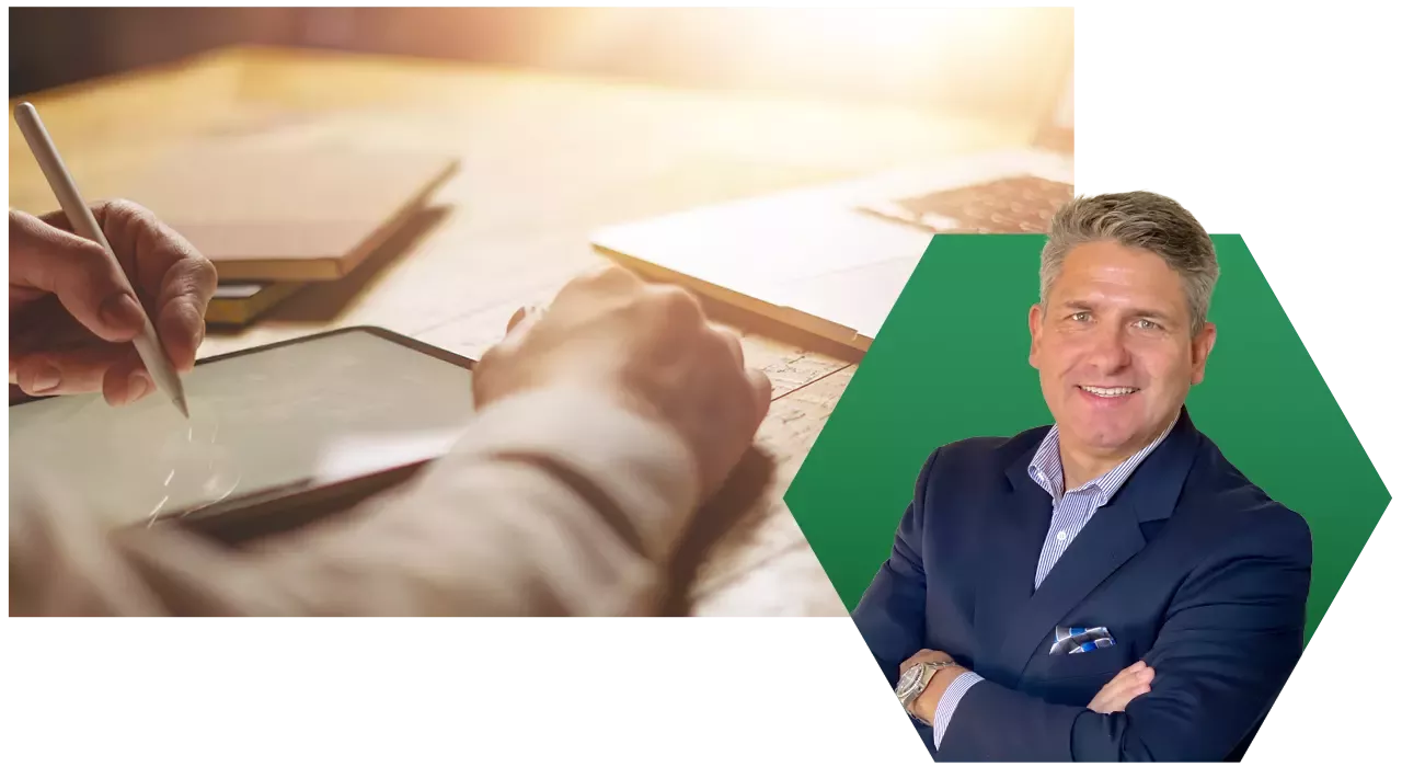 Hands working with a tablet on a table with a laptop computer; a headshot of CEO & Founder, Chris Cabrera, set against a green hexagon is set in the lower right-hand corner