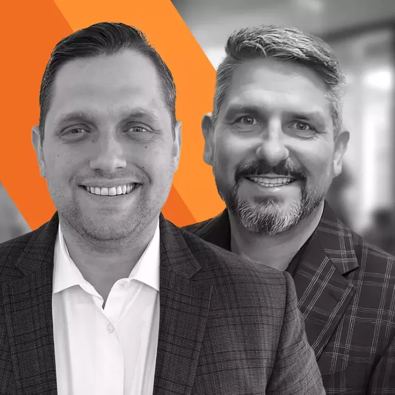 two men looking forward and smiling at the camera blog header for Xactly