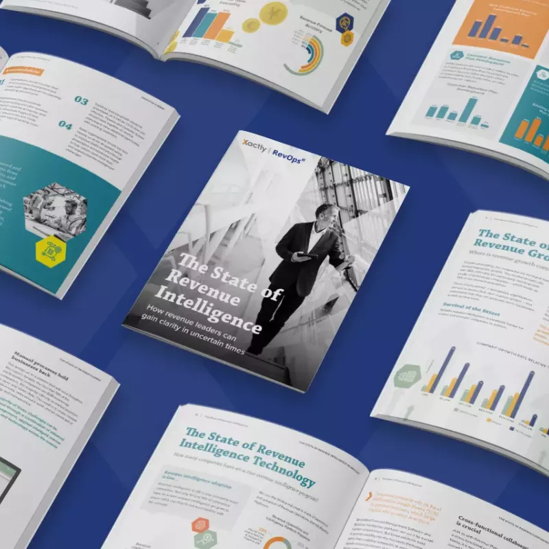 A spread of magazines featuring The State of Revenue Intelligence in the middle, all on a blue background