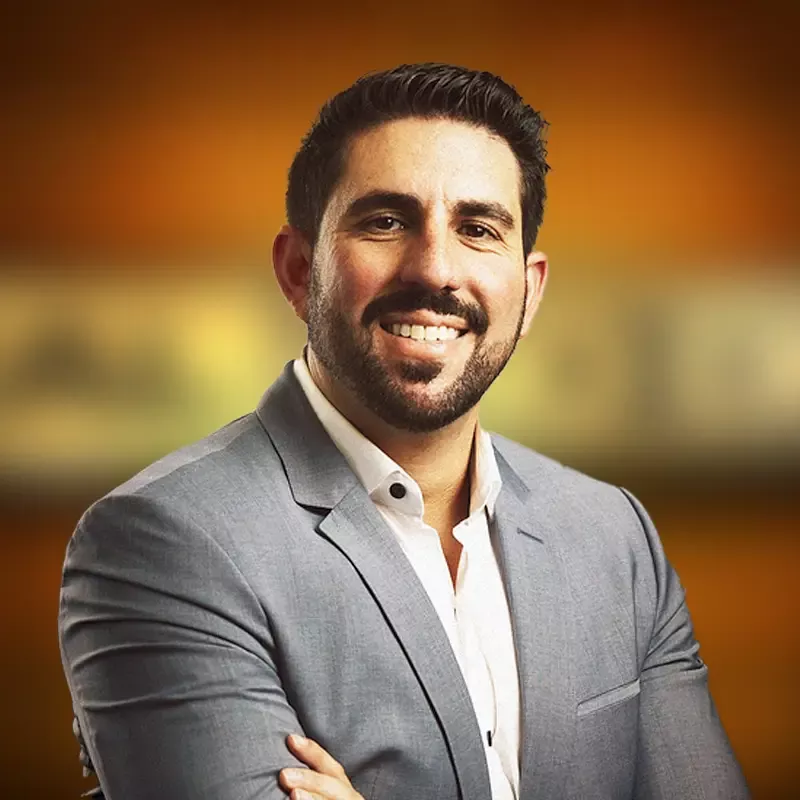 headshot of Taylor Wilding, Xactly VP of Sales 