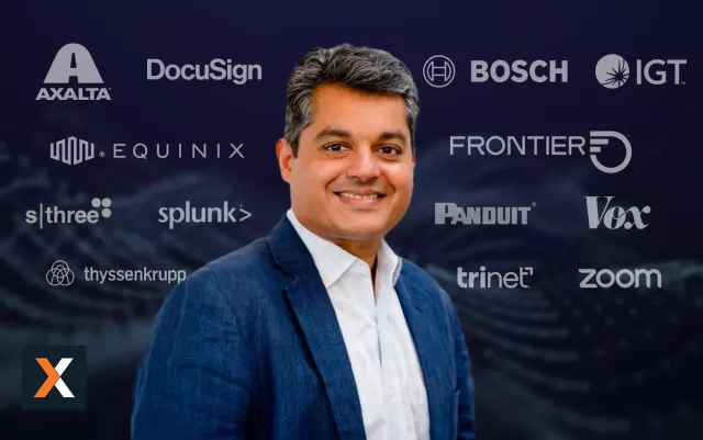 Headshot of Arnab Mishra with Xactly customer logos in the background